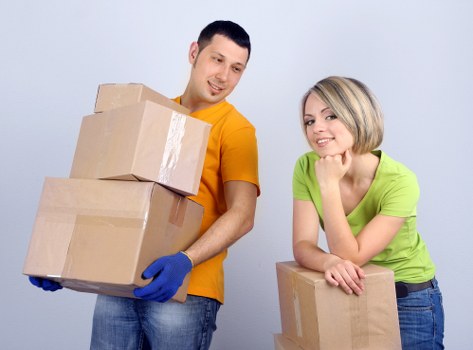 Family home move setup with boxes and furniture in Falconwood