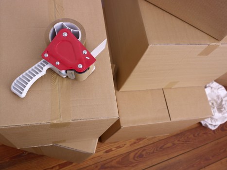 Packed boxes and wrapped furniture ready for moving day