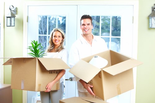 Packed boxes and furniture ready for transport during Falconwood removals